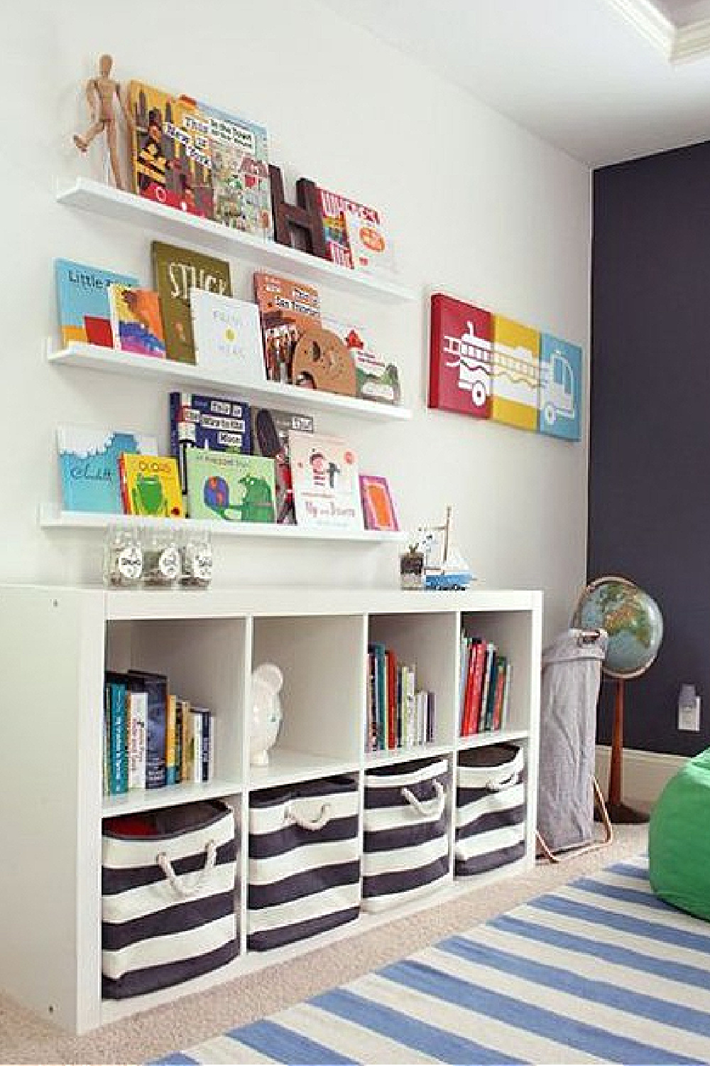 Kids room with floating shelves above Kallax from Ikea with black stripe baskets. #kallaxhack #kidsrooms