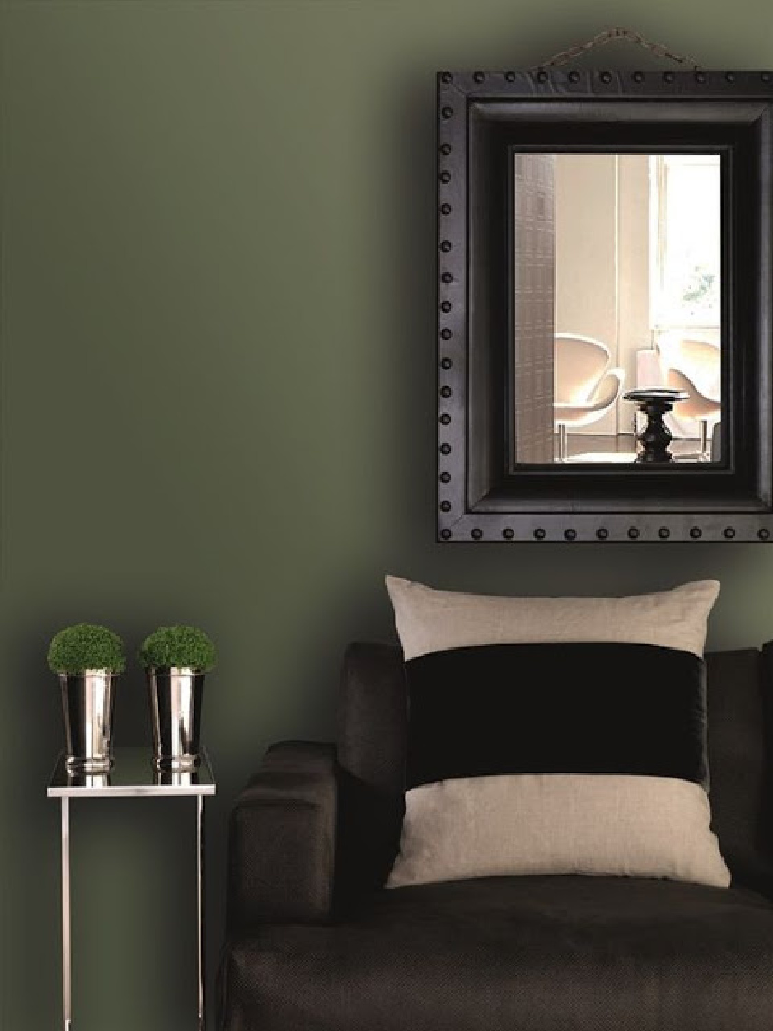 Deep green walls and black in a moody living room. Come explore Dark Green Paint, Autumnal Greens & Interior Design Inspiration!