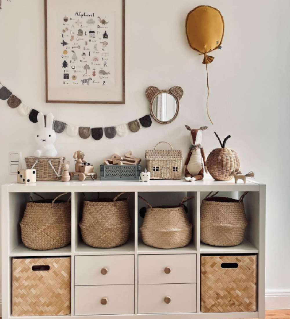 Kallax shelf hack in neutral nursery kids room with belly baskets and Scandi design - @__mamalina__. #ikeahacks #kallaxshelf #kidsroom