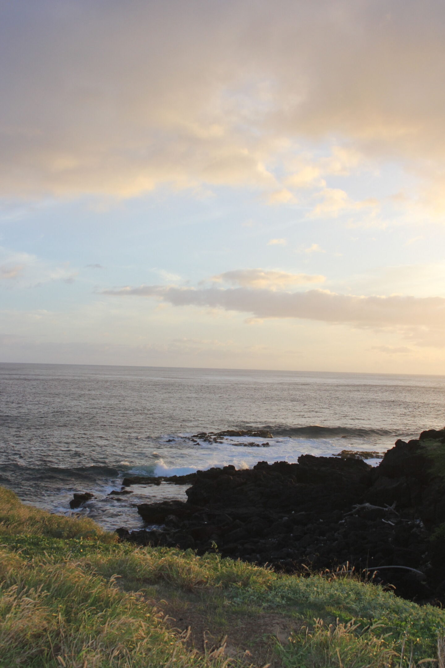 The glorious Pacific and mountainous landscape at Ka'ena Point on Oahu, where we hike to a seabird sanctuary to glimpse Laysan albatross beauty - Hello Lovely Studio. 