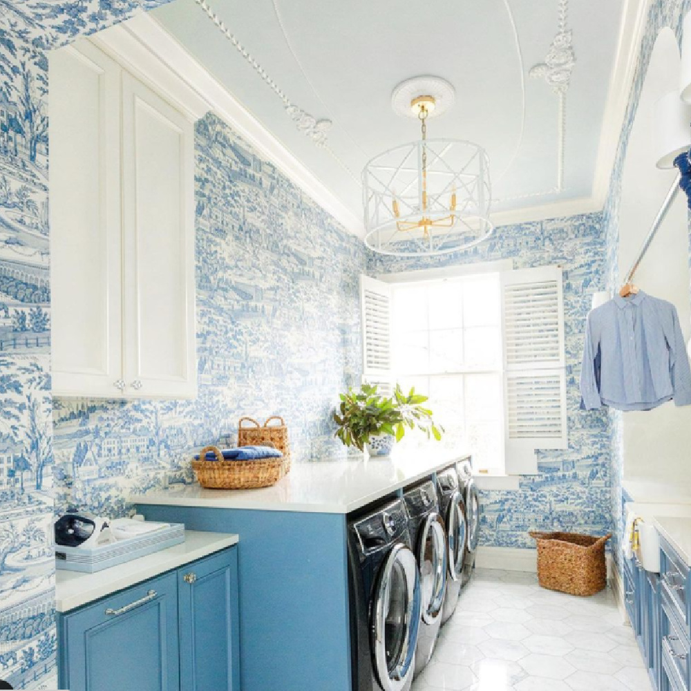 Blue laundry room with French toile wallpaper and elegant design by Alexander Interiors Nashville. #frenchtoile #laundryroom
