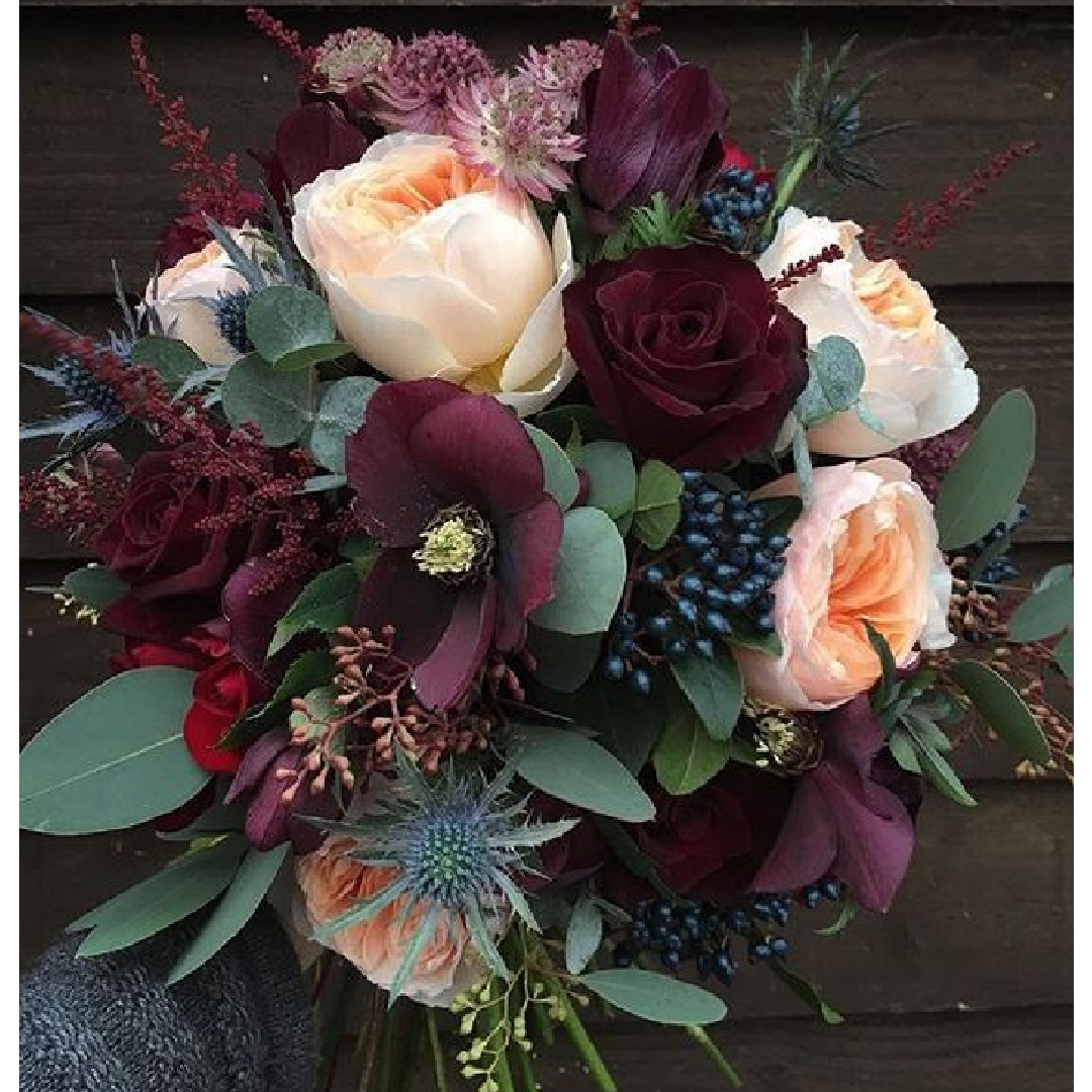 Rich burgundy, green and peach fall floral arrangement by Sarah Winward. Come explore Dark Green Paint, Autumnal Greens & Interior Design Inspiration!