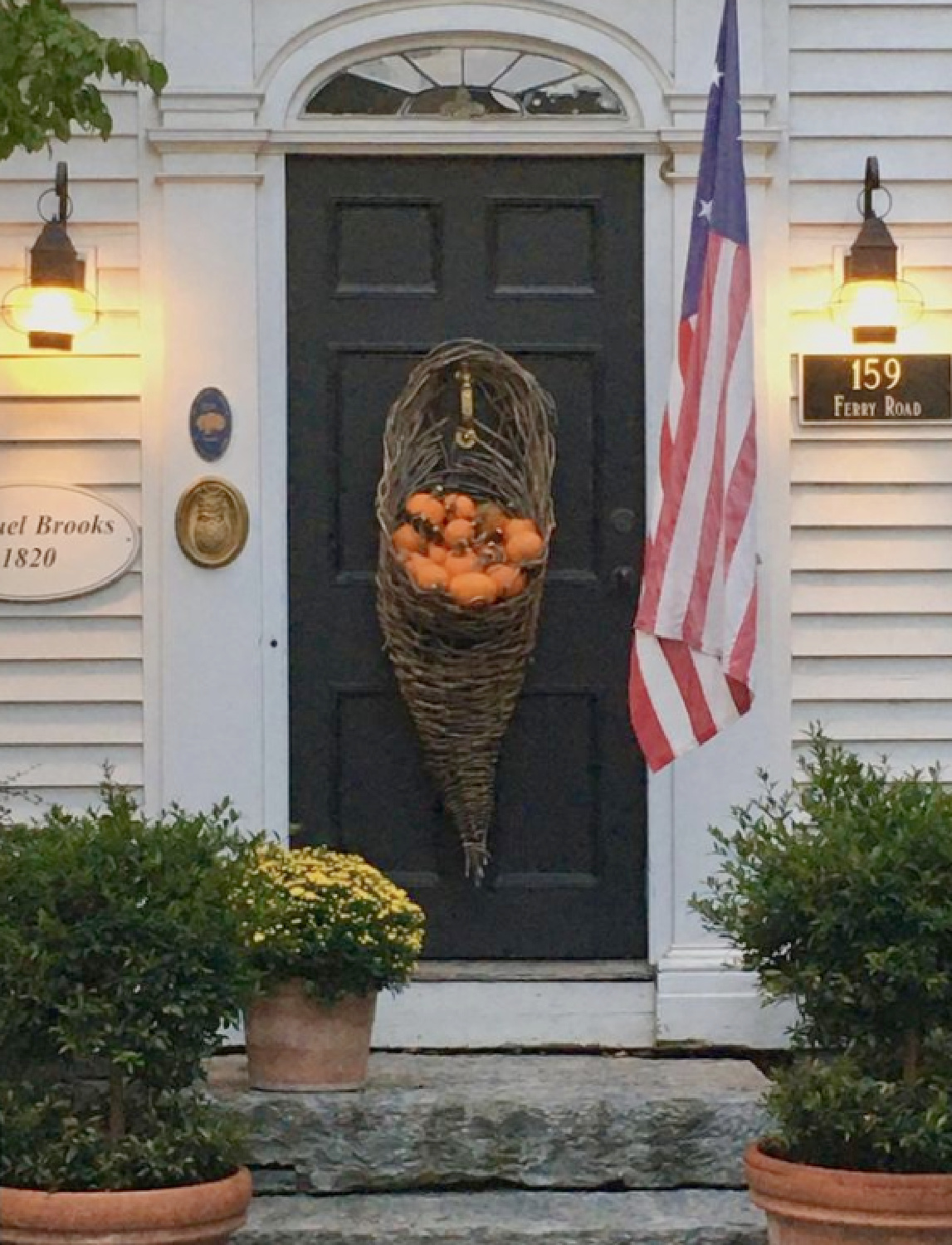 Fall front door of historic home - Nora Murphy Country House. #falldecor #frontdoor #fallporch