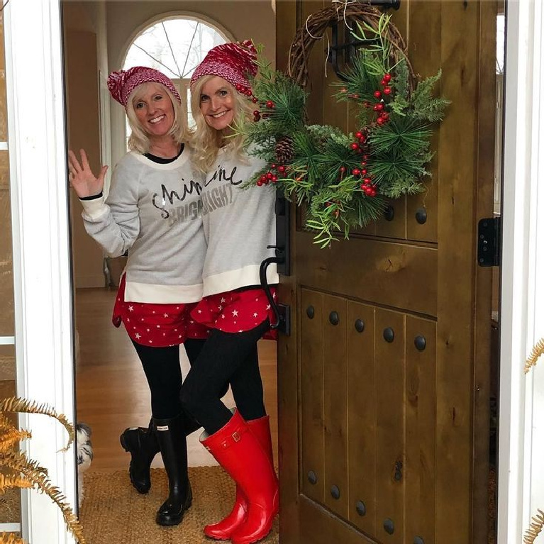 Hello Lovely Christmas joy at my front door with holiday wreath and me and sis dressed in festive wear. #hellolovelystudio #christmasdecor #christmaswreath #christmasdoor