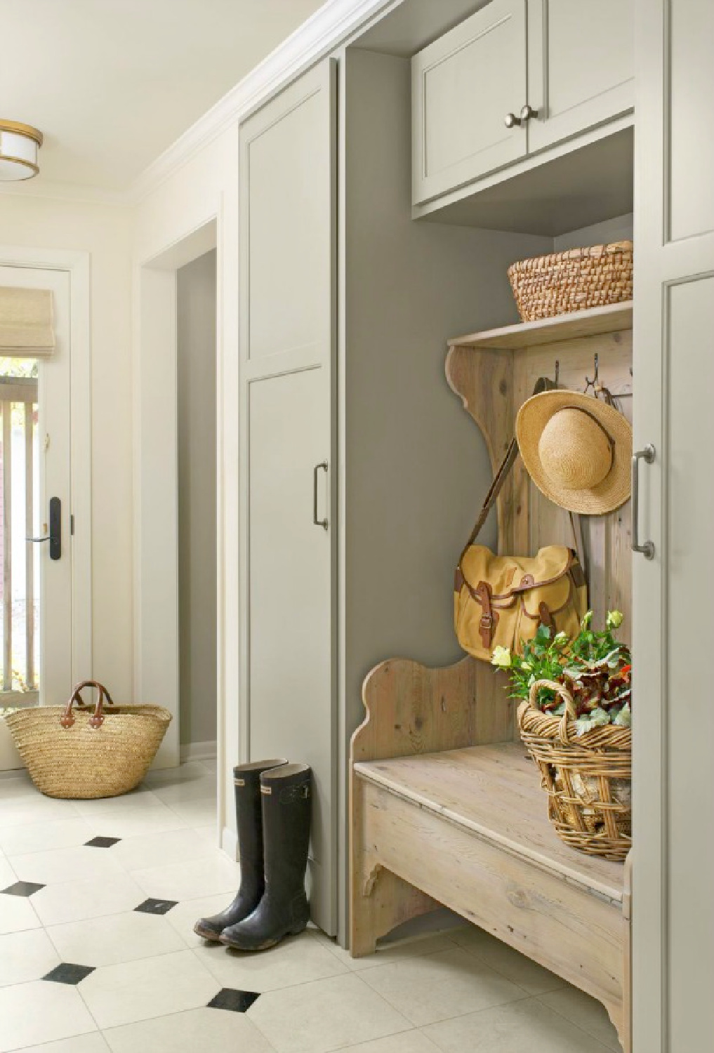 Beautiful mud room with custom built ins, farmhouse bench, and cozy design - Country Living, photo by Kimberly Gavin. Come enjoy Traditional Laundry Room and Mud Room Design Ideas, Resources, and Humor Quotes!