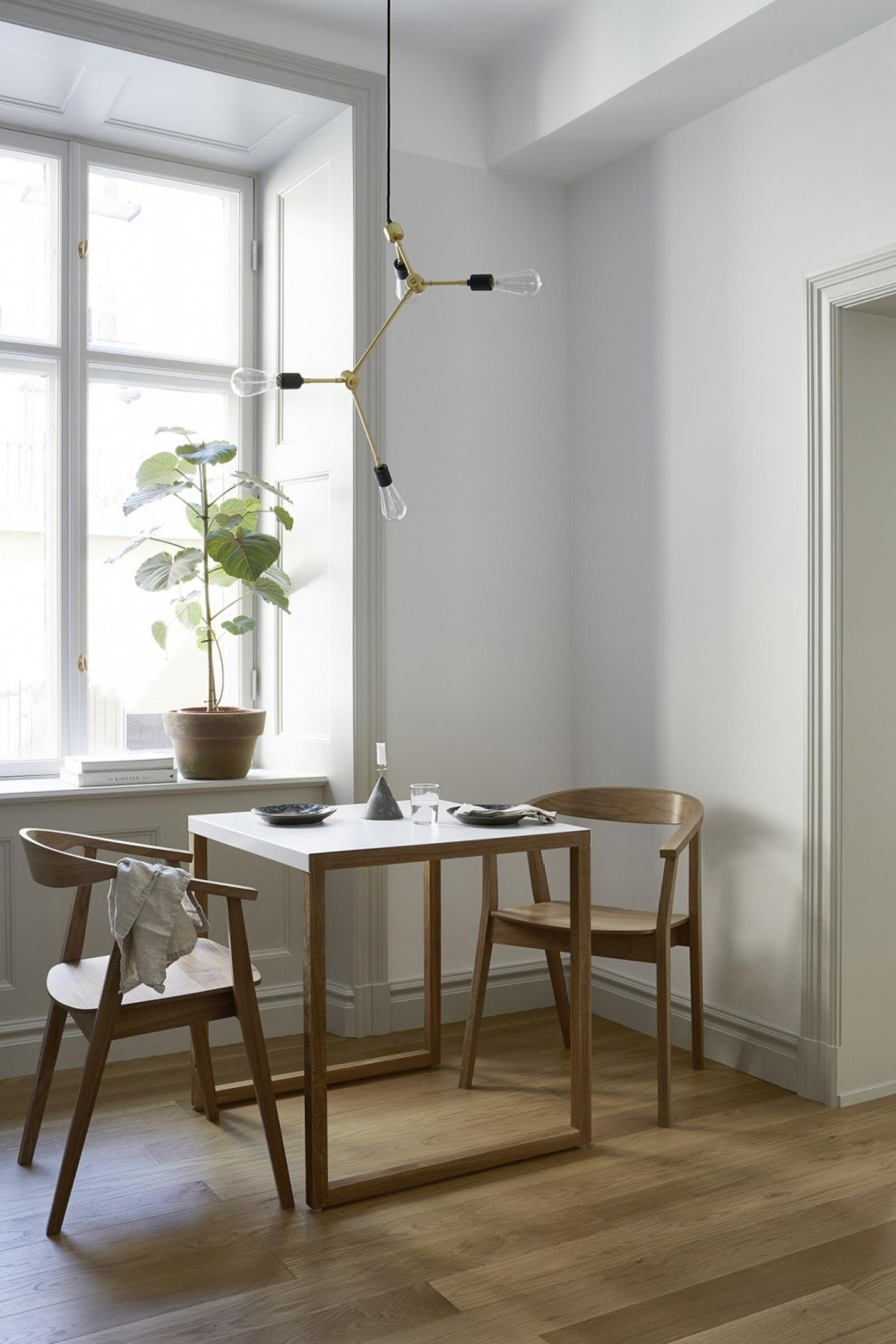 Serene white Stockholm apartment styled by Josefin Haag - Fantastic Frank. #stockholmapartment #minimaldesign #tinyapartment #serenehome