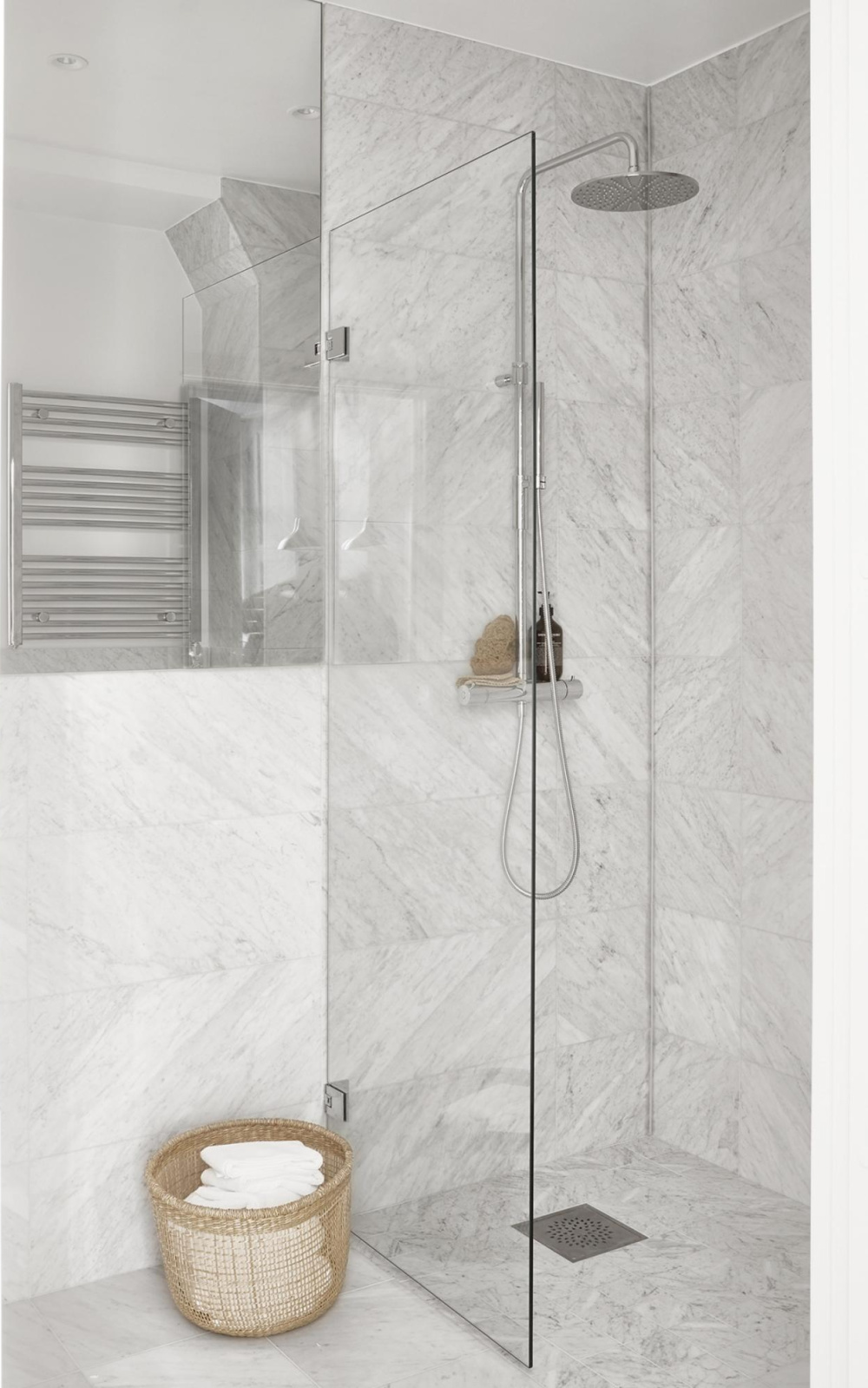 Luxurious marble white bathroom in Stockholm apartment.