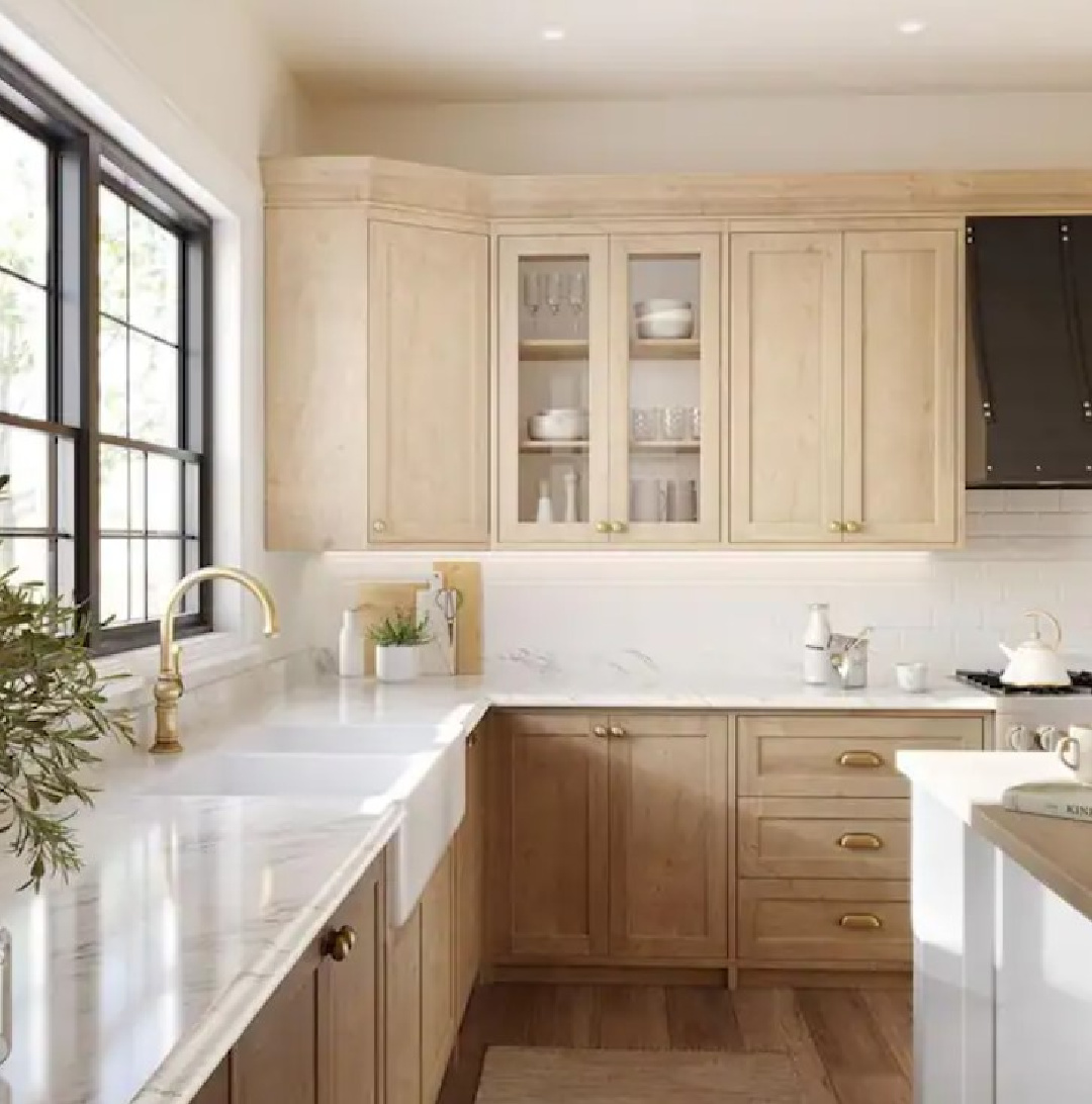 Calautta marble look laminate countertop (Wilsonart) with ogee edge and backsplash in a serene kitchen - Home Depot. #laminatecountertops #marblelookcounters