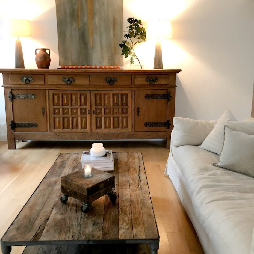 Living room with rustic oak Belgian sideboard and reclaimed elm coffee table - Hello Lovely Studio.