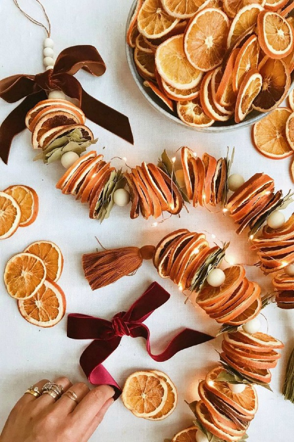 Dried citrus garland from HonestlyWTF. #holidaydecor #christmasdecor #DIY #christmascraft #crafts