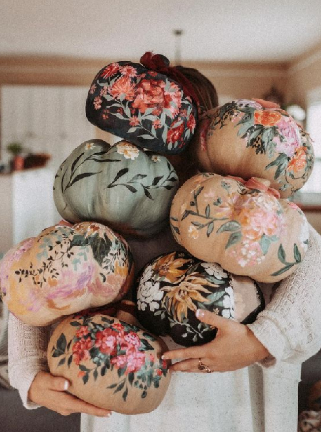 Beautifully handpainted paper mache pumpkins with floral motif - @abbylynneartist #paintedpumpkins