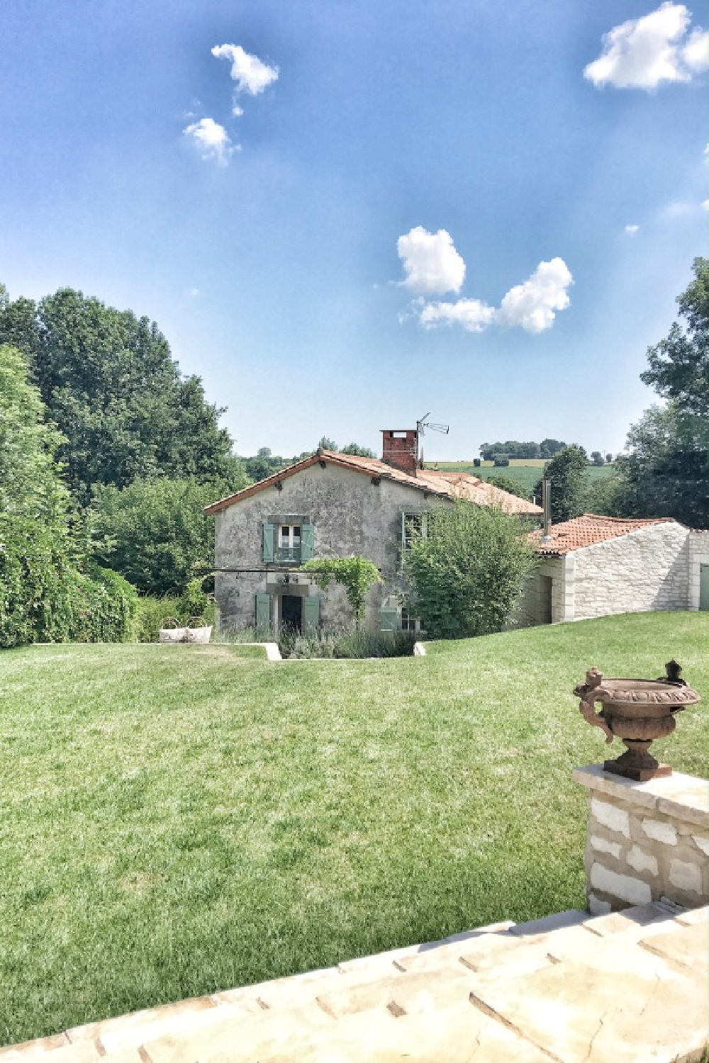 Rustic stone Bordeaux farmhouse with green shutters in French countryside. #vivietmargot #frenchfarmhouse #exterior 