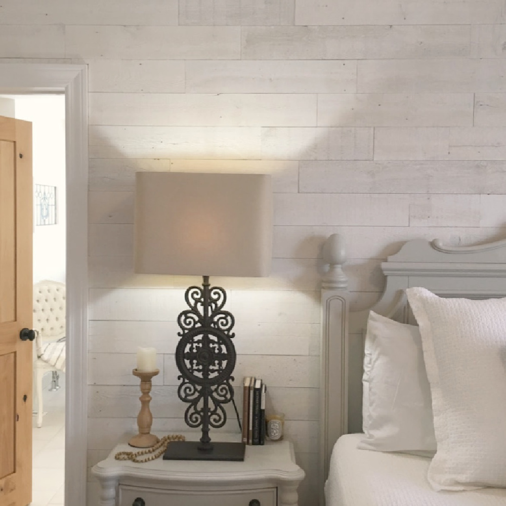 Stikwood Hamptons reclaimed pine peel and stick wood statement wall in our white French country romantic bedroom - Hello Lovely Studio. #frenchcountry #hellolovelystudio #bedroomdecor #stikwood #hamptons #shiplap #woodplank #statementwall