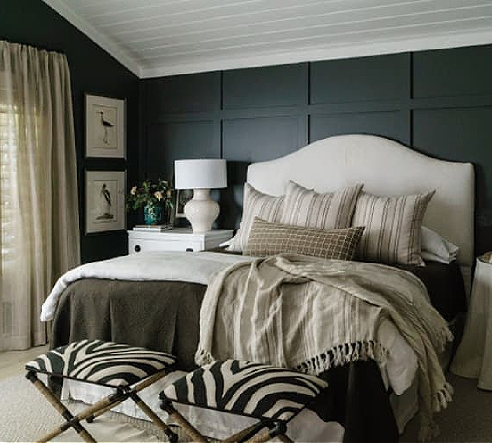Iron Mountain (Benjamin Moore) on bedroom walls with board and batten trim, upholstered headboard, and animal print ottomans - Sherry Hart of Design Indulgence. #ironmountain #paintcolors
