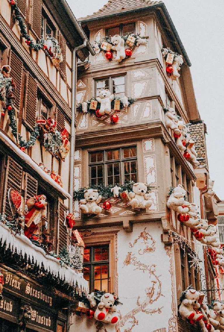 French Christmas decor with huge teddy bears on buildings in Strasbourg, France - Odrida. #frenchchristmas #christmasdecor #holidaydecor #frenchholiday #christmasdecorating #teddybears