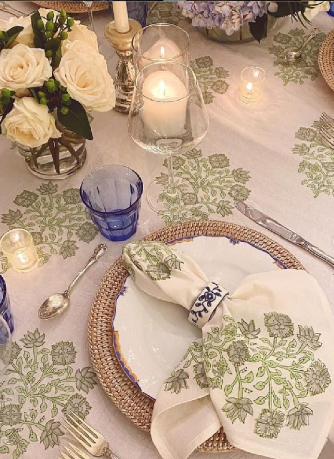 Beautiful Christmas place setting and holiday table with soft green and blue accents - @meganstokes. #holidayplacesetting