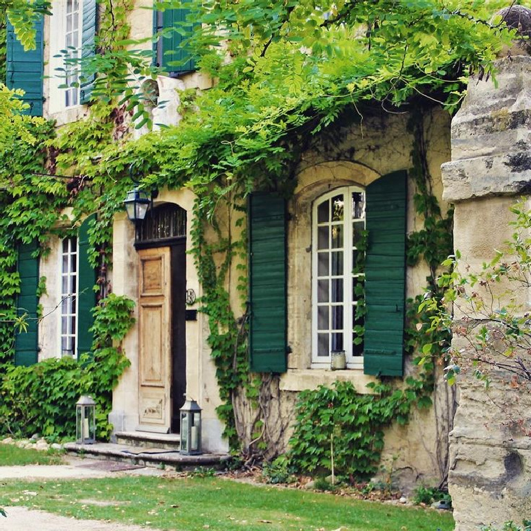 Brethtaking French country home exterior with climbing vines, rustic stone and shutters, and Old World style - @adornedcottage. #frenchcountry #exteriors #frenchhome #rusticfrench #romanticfrenchcountry #frenchcountryside