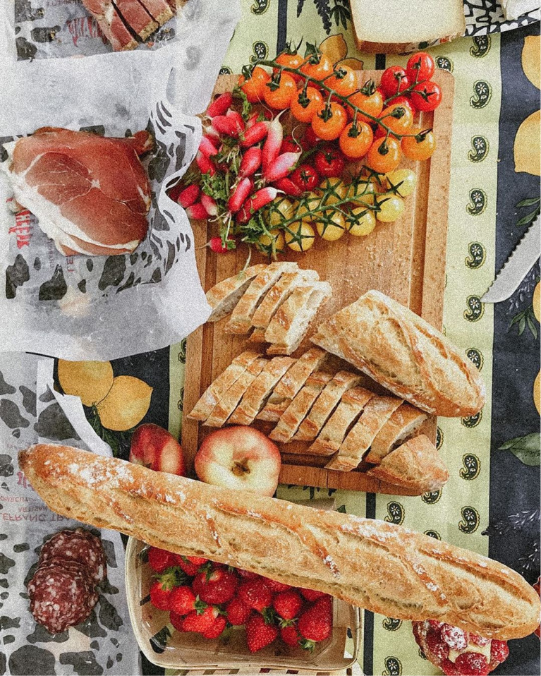 Glorious French countryside picnic with bread and charcuterie - @thetravelmuse. #frenchpicnic #frenchcountry #charcuterie #frenchcountryside #frenchfall