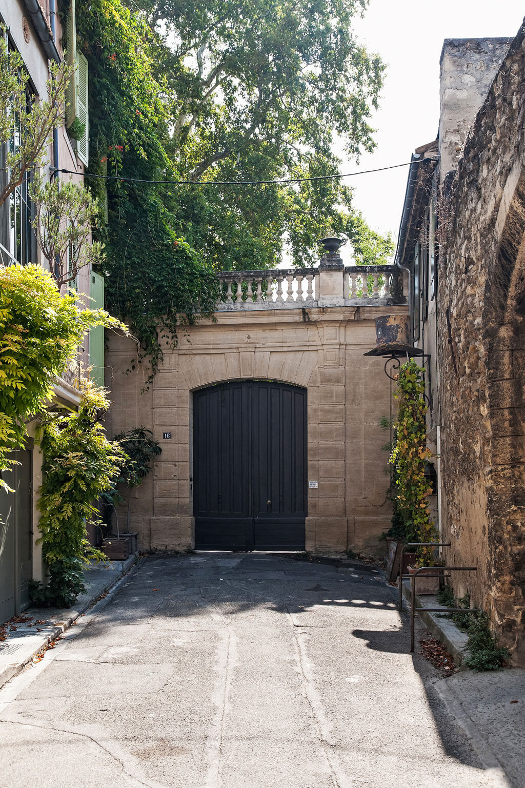 Rugged stone facade of ancient stone buildings near Avignon Hôtel Particulier, a beautifully restored 19th century mansion in the heart of Avignon’s historic center - Haven In. #exteriors #frenchstone #frenchchateau #provence #frenchcountry #restoredchateau #southoffrance #aivgnonhotel