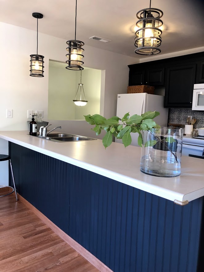 What a difference it made when we removed the soffit over the breakfast bar. Now the space is airy and more modern.