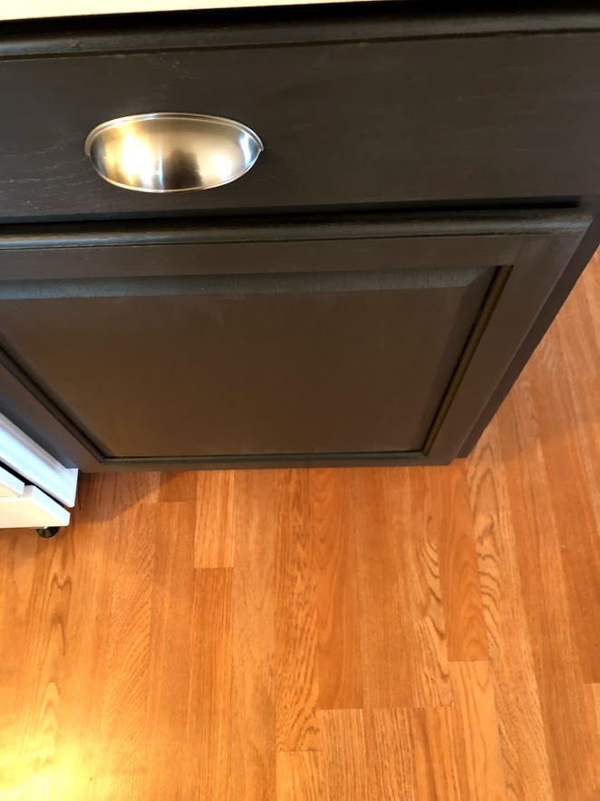 Sherwin Williams Carbonized painted kitchen cabinet.