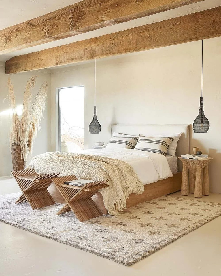 Natural zen rustic Scandi inspired bedroom with rugged wood beams and neutral colors - Planetedeco.