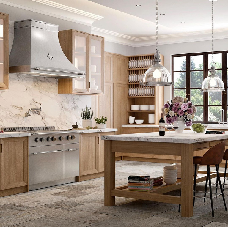 Lovely French range and custom hood in a Beverly Hills bespoke kitchen by L'Atelier Paris. #customkitchen #dreamkitchen #frenchrange #Frenchkitchen