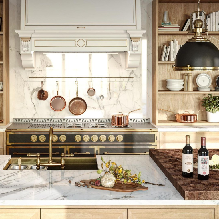 Luxurious French range with copper pots on rack above and open shelving in the bespoke kitchen by L'Atelier Paris. #frenchkitchen #frenchrange #luxurykitchens #bespoke