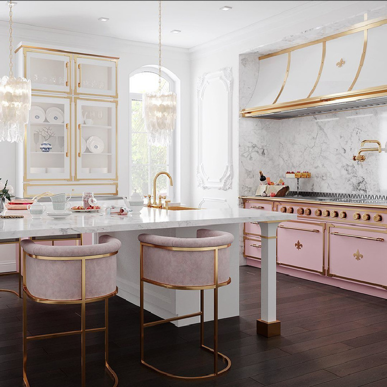 Luxurious pink French country bespoke kitchen by L'Atelier Paris. #pinkkitchen #luxuriouskitchens #bespoke #frenchrange