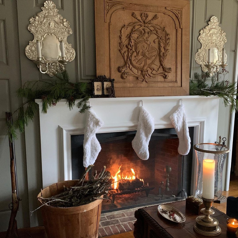 French Christmas decorated space with fireplace and stockings - @marchionesshg