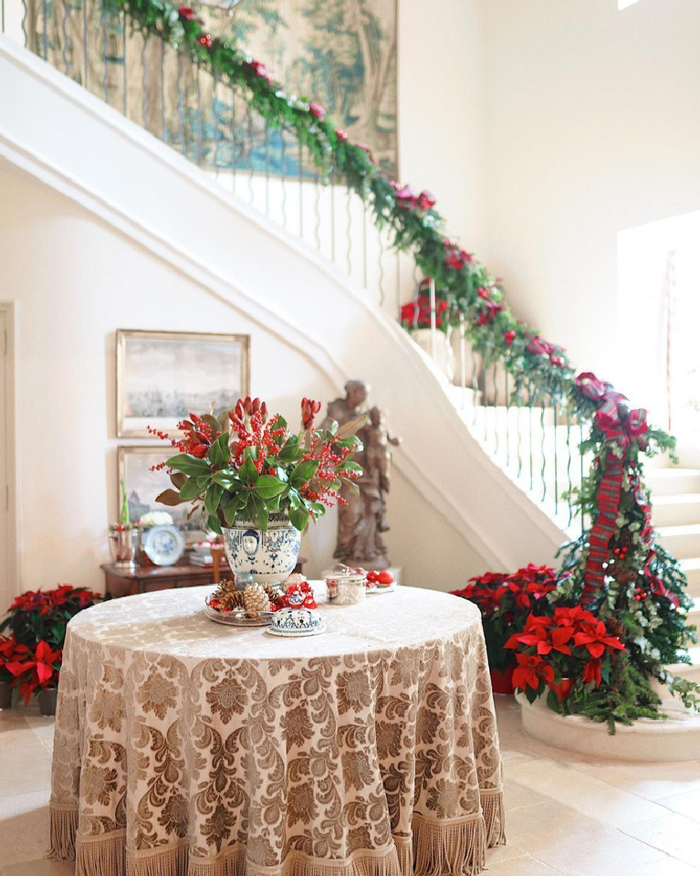 Provence Christmas decor in a grand chateau with garland on staircase - @provencepoirers. 