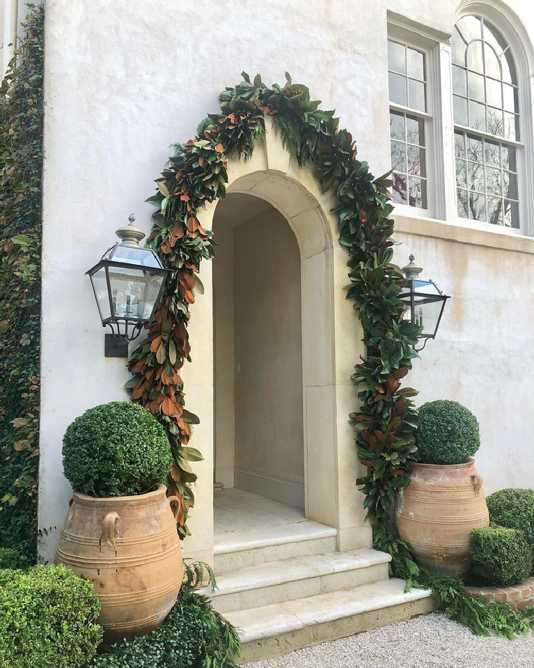 Elegant exterior Christmas decor with a French country feel by Pamela Pierce of Milieu. Enjoy Glorious Holiday Decorations & Inspiring Quotes for 2021 Now!