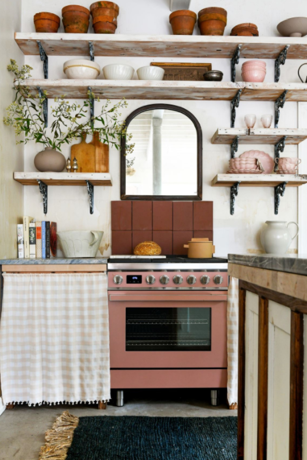 Leanne Ford designed kitchen with dusty rose range in her Pittsburgh guest cottage - photo by Erin Kelly for Pittsburgh Post Gazette. #modernrustic #vintagestyle