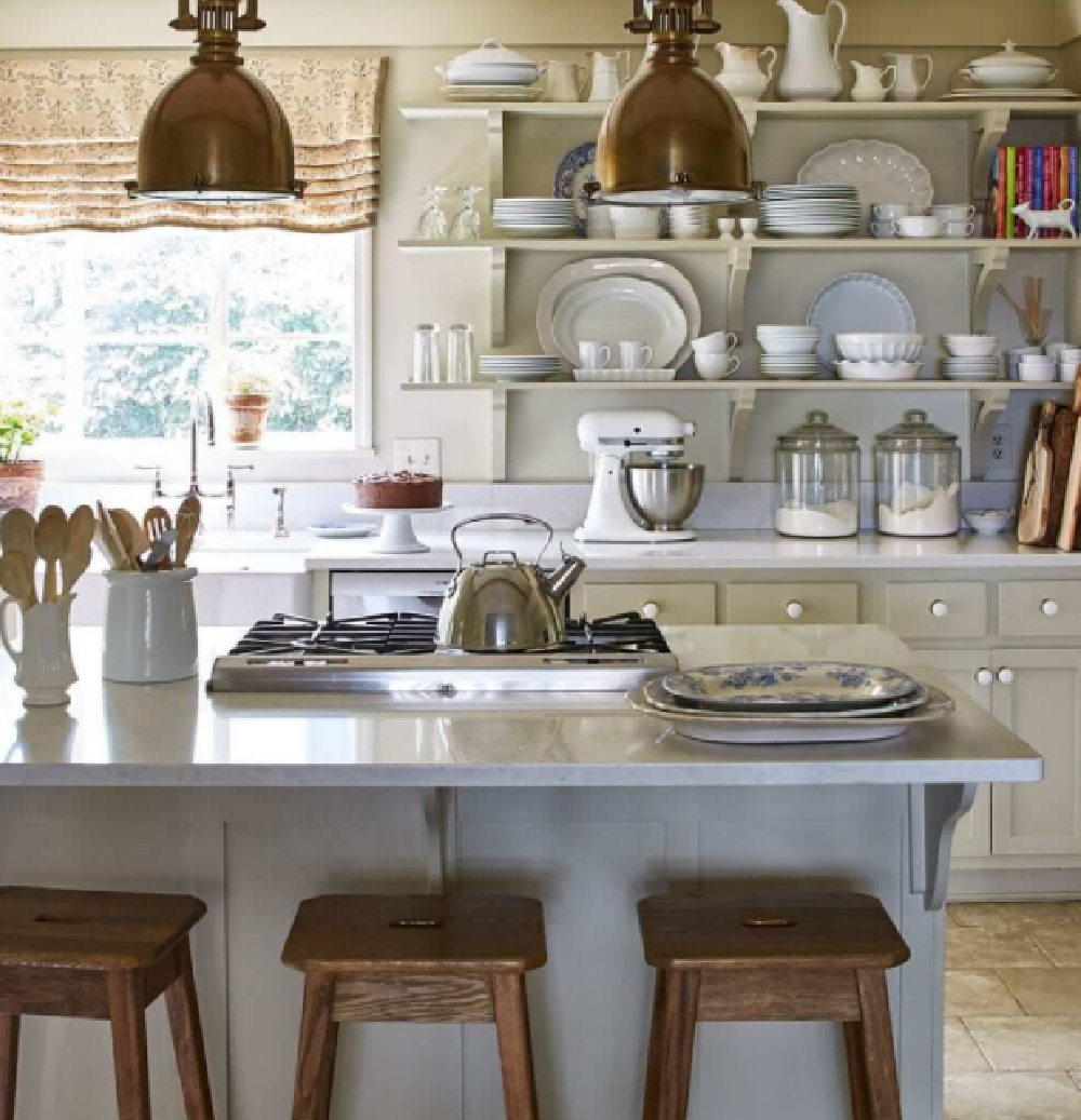 Beautiful country kitchen with vintage pendants over island and open wood shelves - Nora Murphy Country House book.