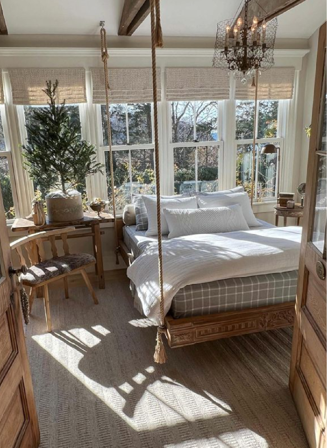 Beautiful rustic cottage style bedroom with raw organic wood and rope bed - @oldsilvershed.