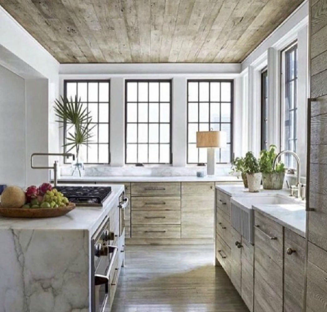 Serene kitchen with timeless architecture and design by Atlanta-based Jeffrey Dungan who mixes rustic with elegant in luxury home design. #architecture #luxuryhome #jeffreydungan #timelessdesign #kitchen