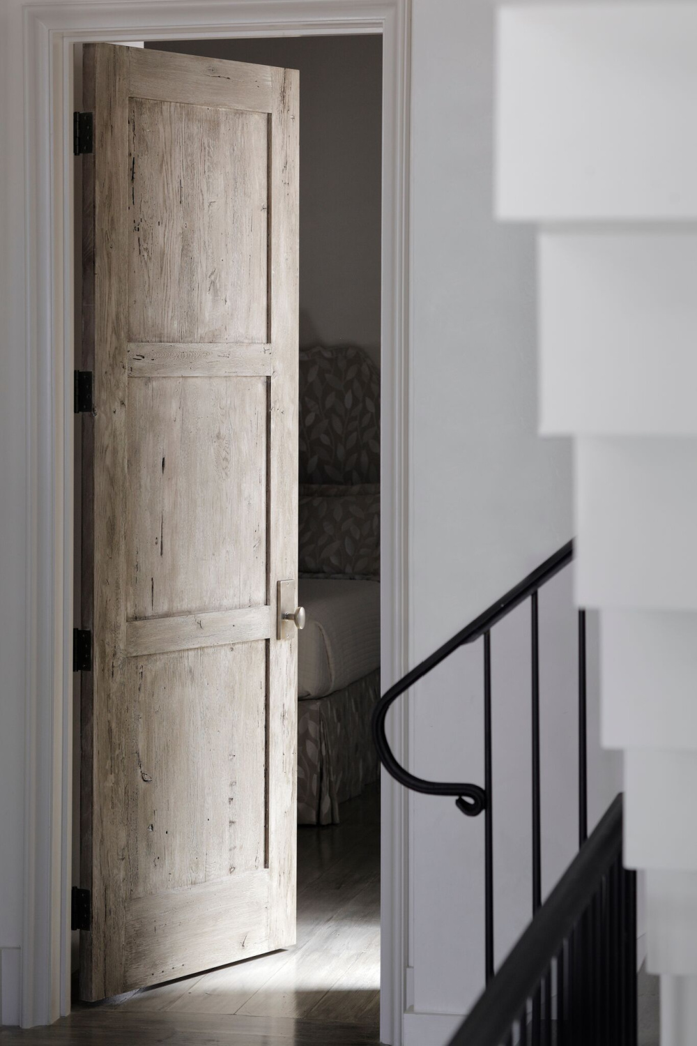 Rustic wood 3-panel door. Stunning interior design and Timeless Architecture Inspiration: Jeffrey Dungan. Photo: William Abranowicz. #classicdesign #traditional #architecture #jeffreydungan #sophisticateddesign #architect