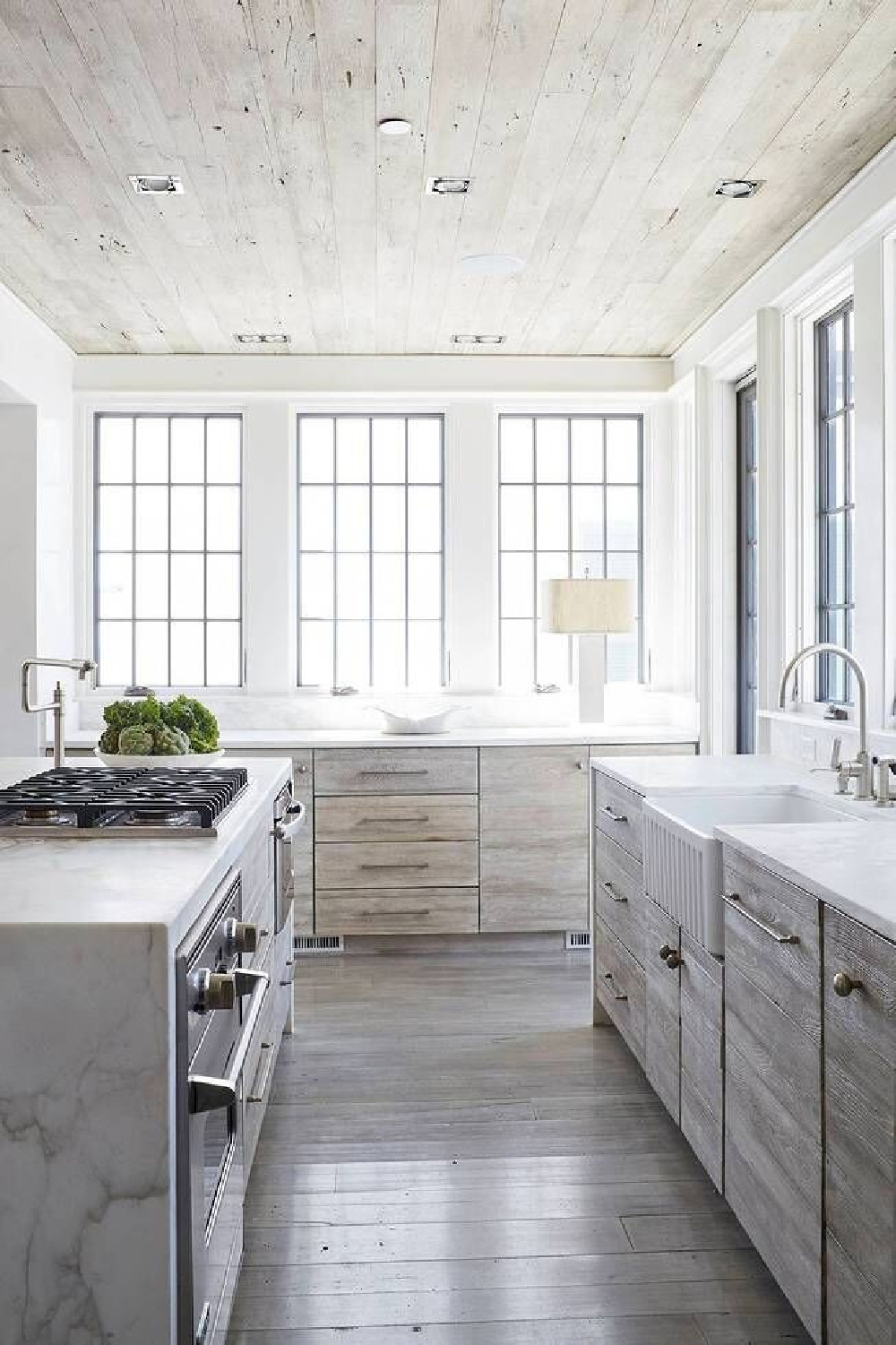 Luxurious kitchen with rustic wood cabinetry. Stunning interior design and Timeless Architecture Inspiration: Jeffrey Dungan. Photo: William Abranowicz. #classicdesign #traditional #architecture #jeffreydungan #sophisticateddesign #architect