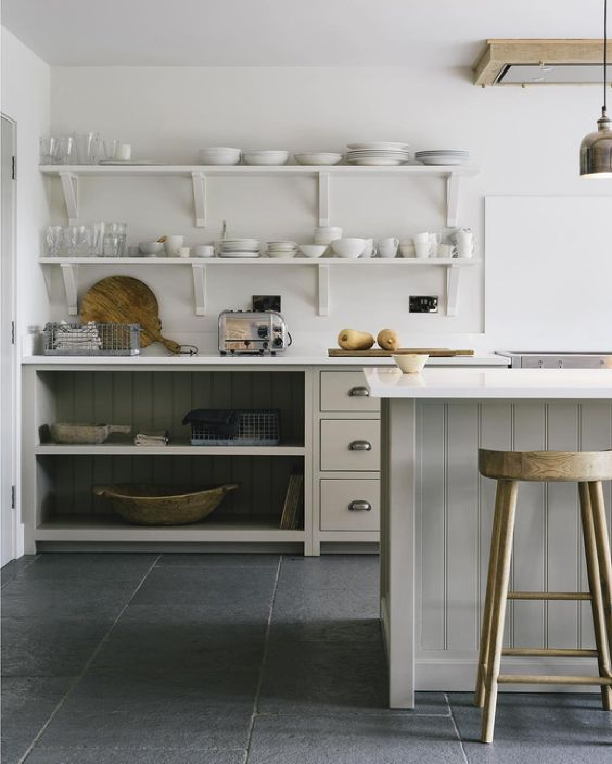 Simple open shelving and beautiful neutral colours, kitchen bliss #deVOLKitchens. Come be inspired by 11 White Kitchen Design Ideas Adding Warmth! #kitchendesign #whitekitchen #kitchenideas #interiordesignideas #whitekitcheninspiration