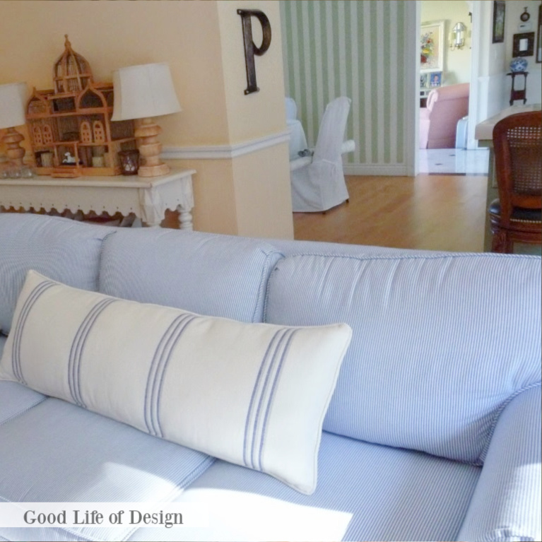 Classic style light blue sofa in a traditional style living room reflecting Grandmillennial style - Good Life of Design.