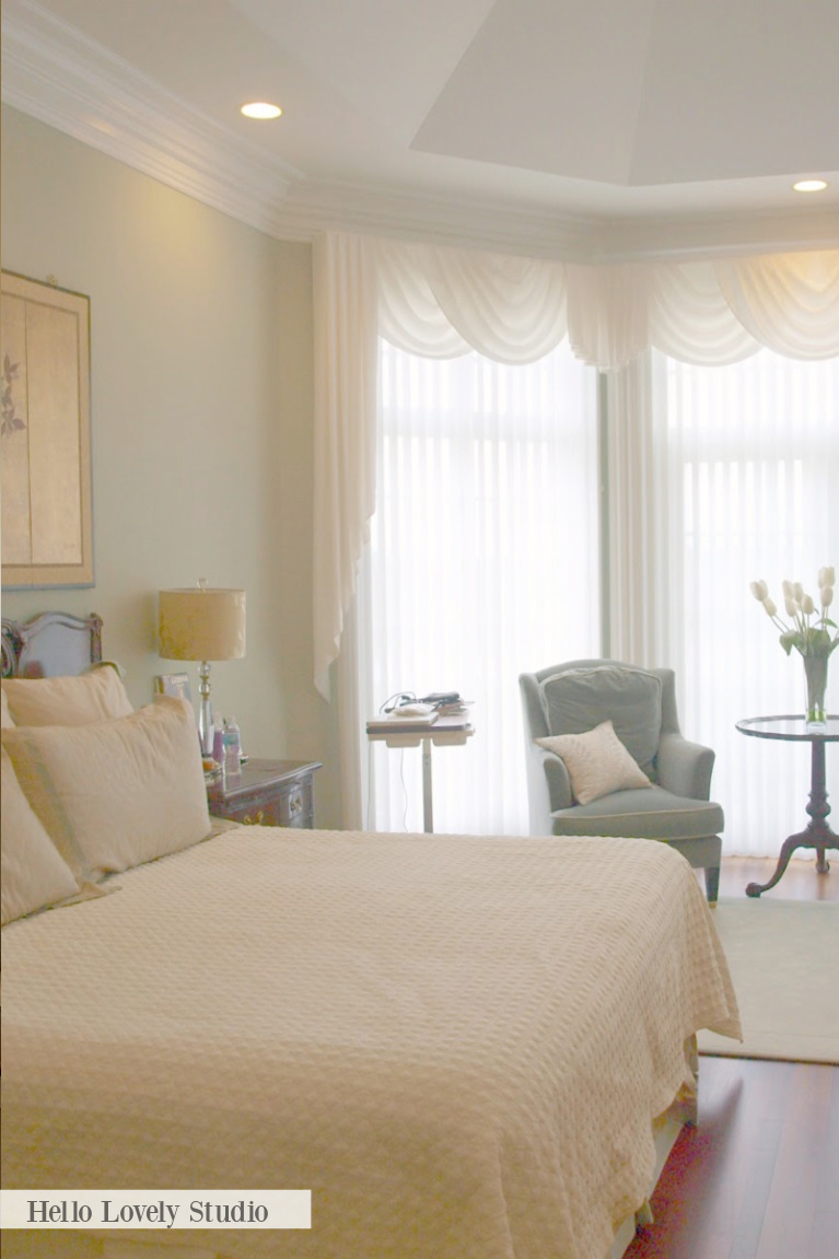 Soft pastels and traditional style drapery in a Grandmillennial style bedroom - Hello Lovely.