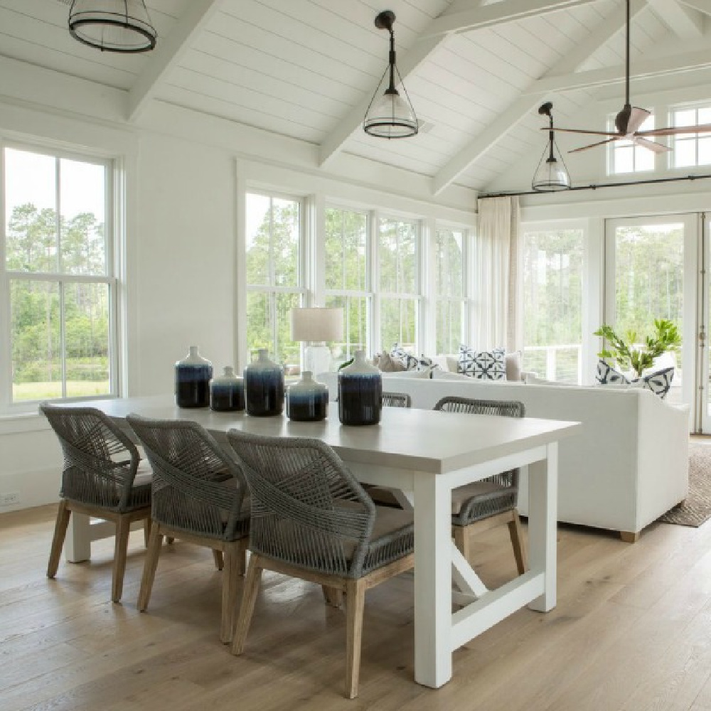 Coastal style great room with white shiplap, white oak hardwood floor, and blue accents - Lisa Furey. 