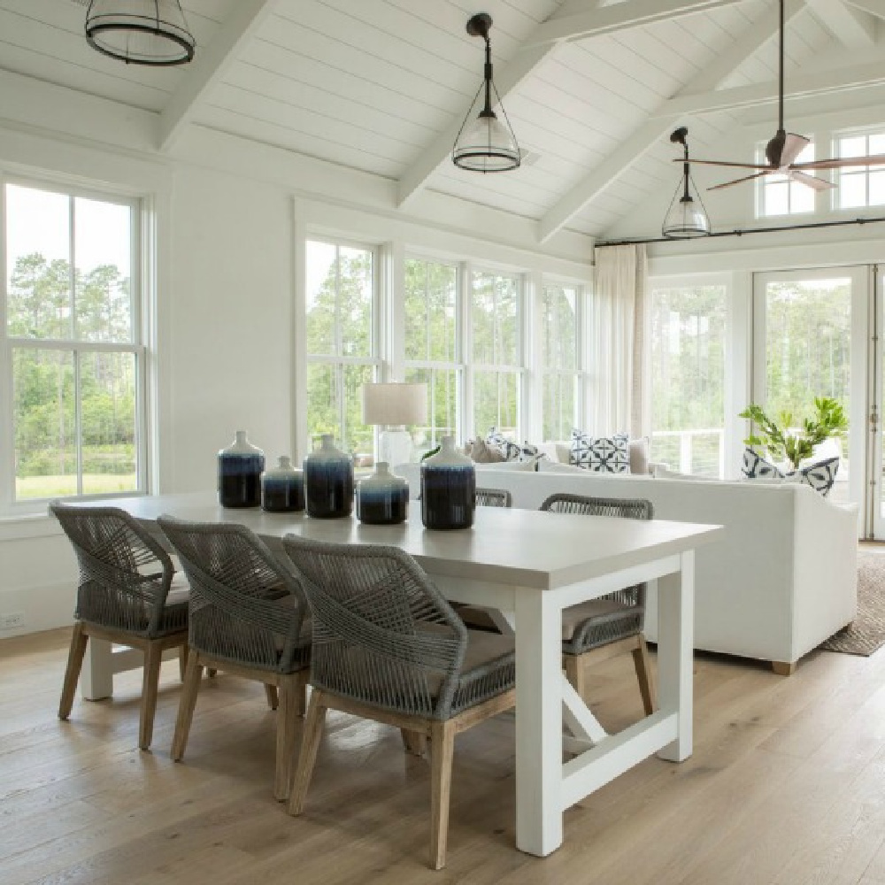 Coastal style great room with white shiplap, white oak hardwood floor, and blue accents - Lisa Furey.