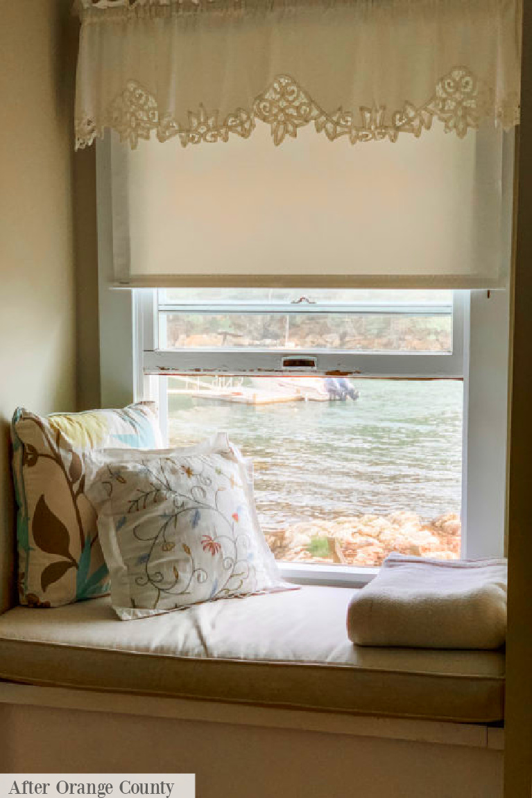 Window seat with traditional style pillows and lace valance - After Orange County. #grandmillennialstyle