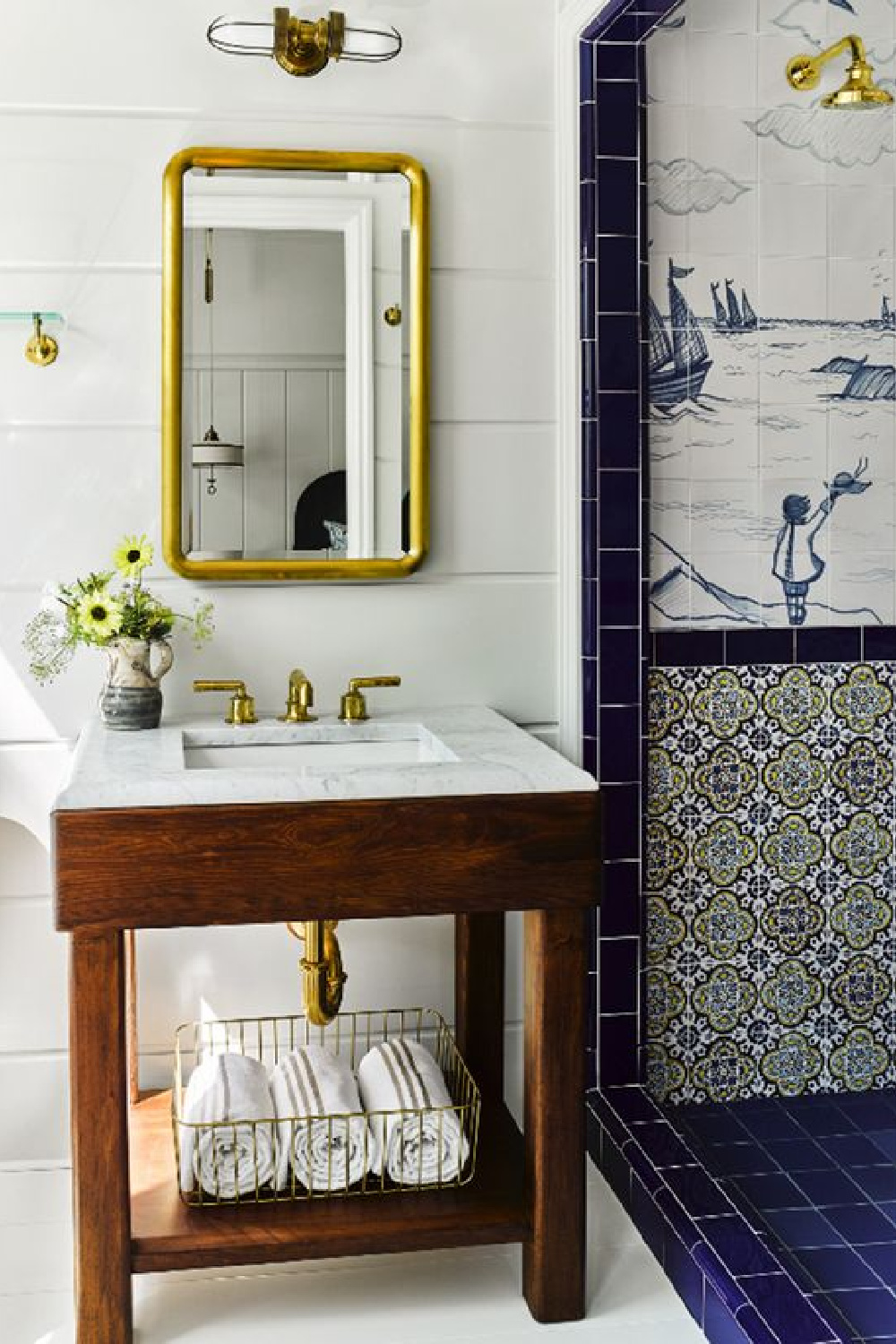 Greydon House bathroom with exquisite cobalt blue tile. COME TOUR MORE Nantucket Style Chic & Summer Vibes! #nantucket #interiordesign #designinspiration #summerliving #coastalstyle