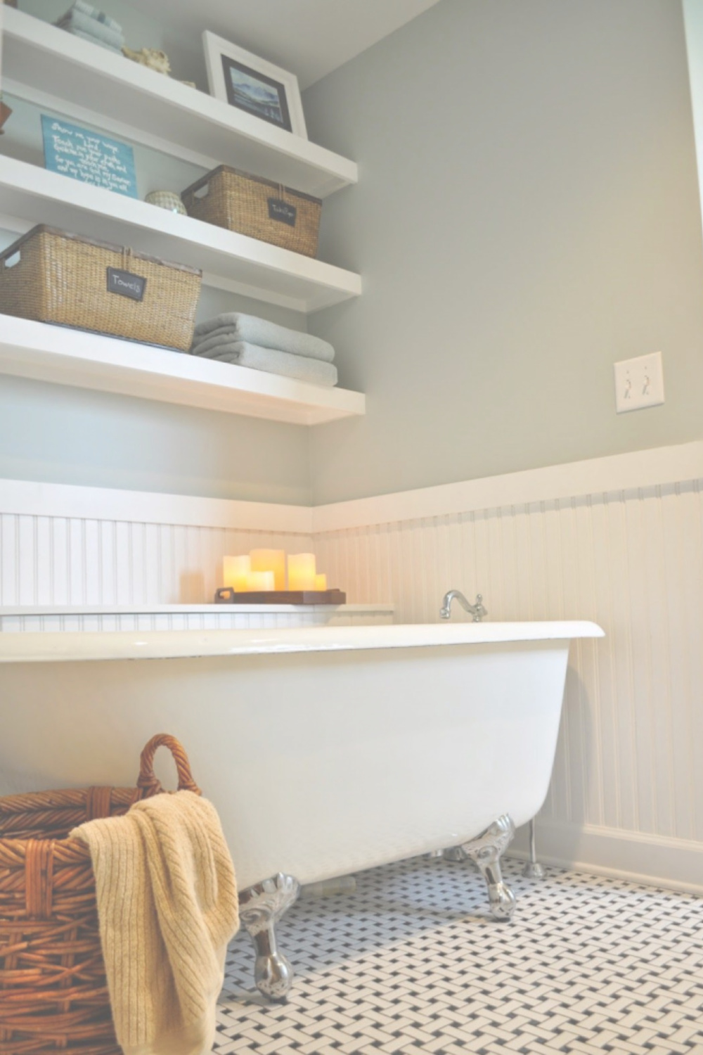 Beautiful pale blue walls in a bathroom with clawfoot tub - paint color is Quiet Moments by Benjamin Moore. #quietmoments #benjaminmoorequietmoments #paleblue