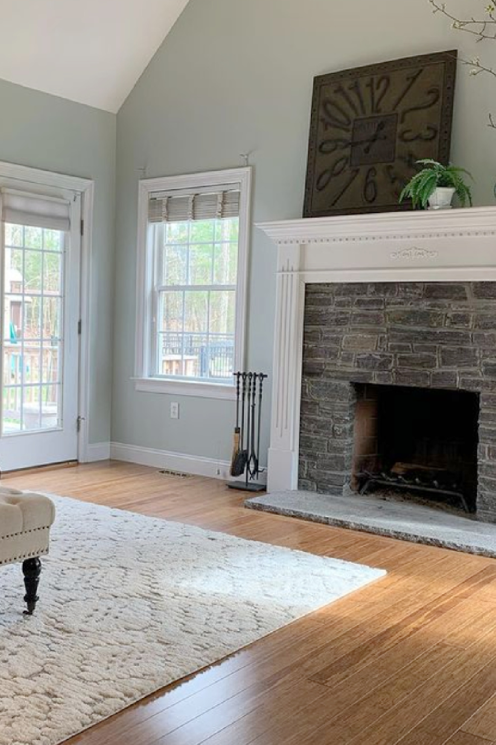 Light blue painted walls in a traditional living room painted Quiet Moments (Benjamin Moore) - @sarahlabrieinteriors. #quietmoments #paintcolors #benjaminmoorequietmoments #paleblue