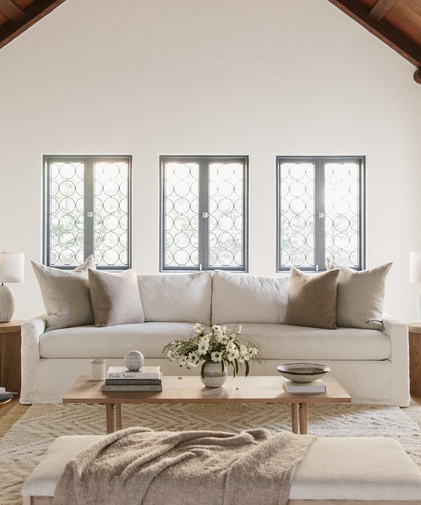 Jenni Kayne Harbor Sofa in Ivory Linen in a gorgeous, subdued, tranquil, natural style living space.