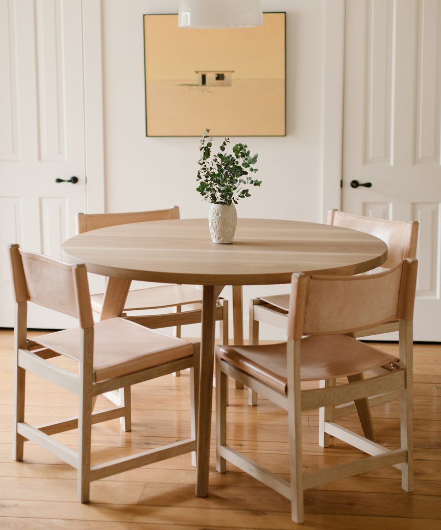 Jenni Kayne round dining table and chairs for a quiet, laid back, Cali luxe organic vibe.