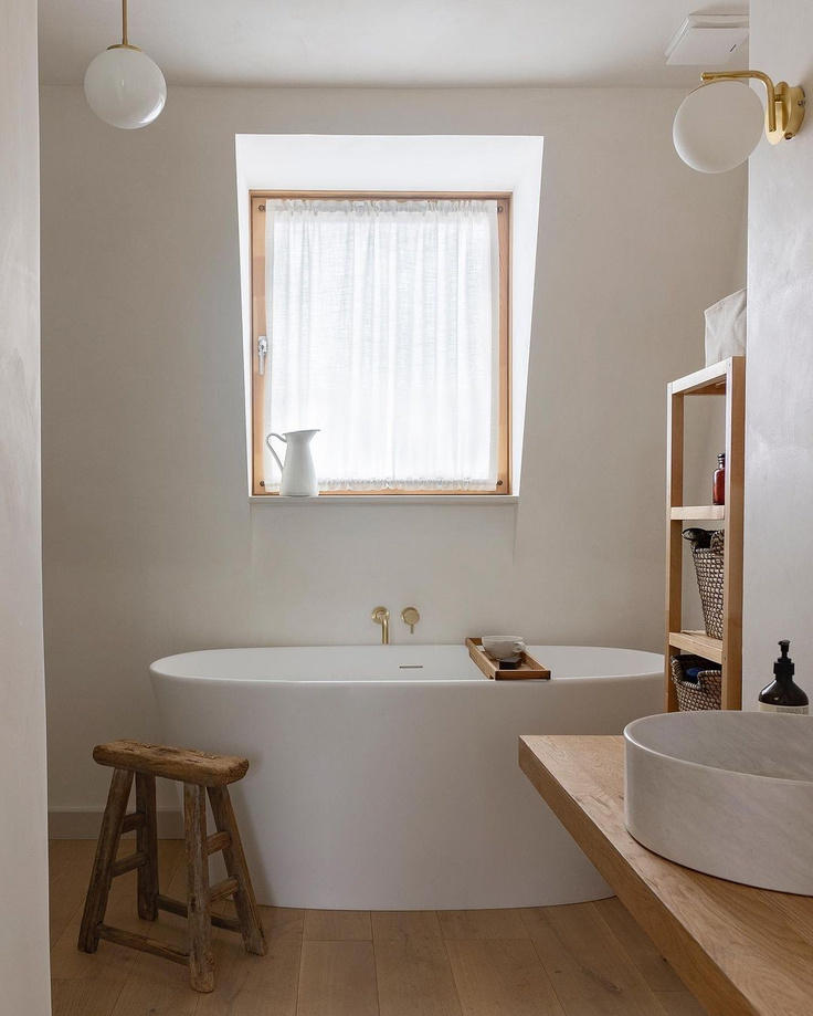 Serene and zen rustic bathroom design with freestanding tub and Japandi style - @thevenetianpantry. #bathroomdesign #japandi